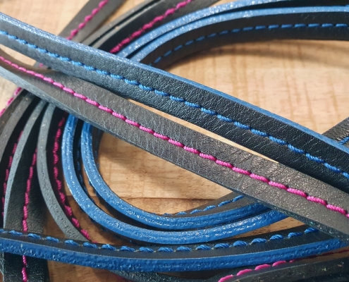 Coloured and stitched leather trims